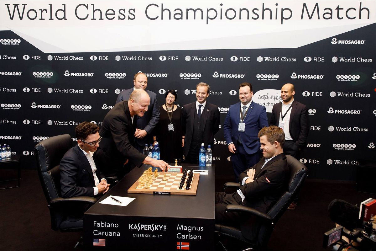 Magnus Carlsen barely saves draw as Fabiano Caruana misses win in