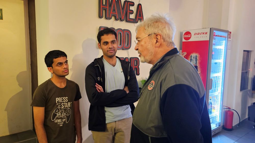 V. P. Kaushik, 11, watches as Indian World Rapid Chess Champion Viswanathan  Anand, unseen right, makes a move at the launch of a school chess  tournament organized by the NIIT Mind Champion's